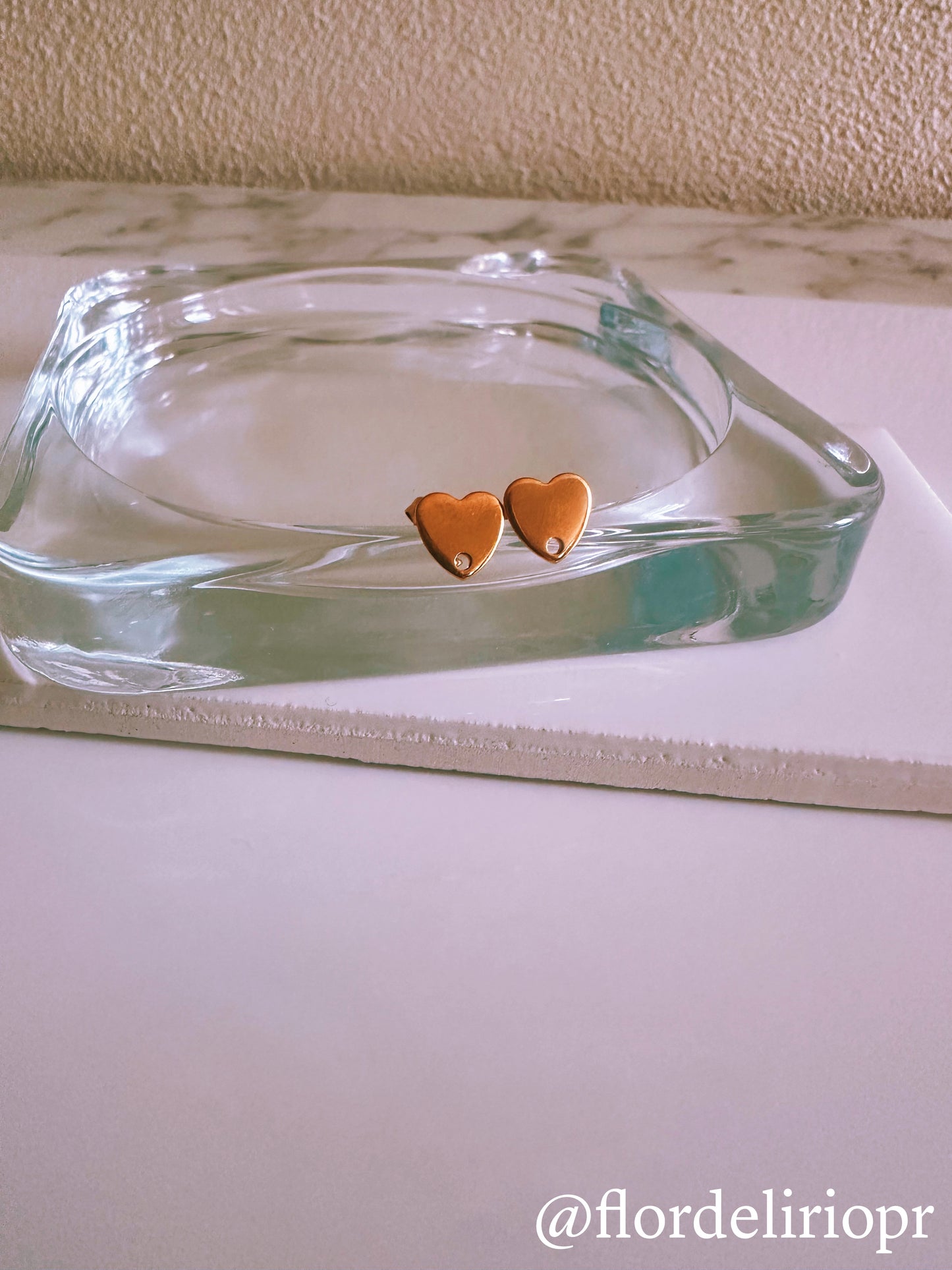 Gold heart stud earrings