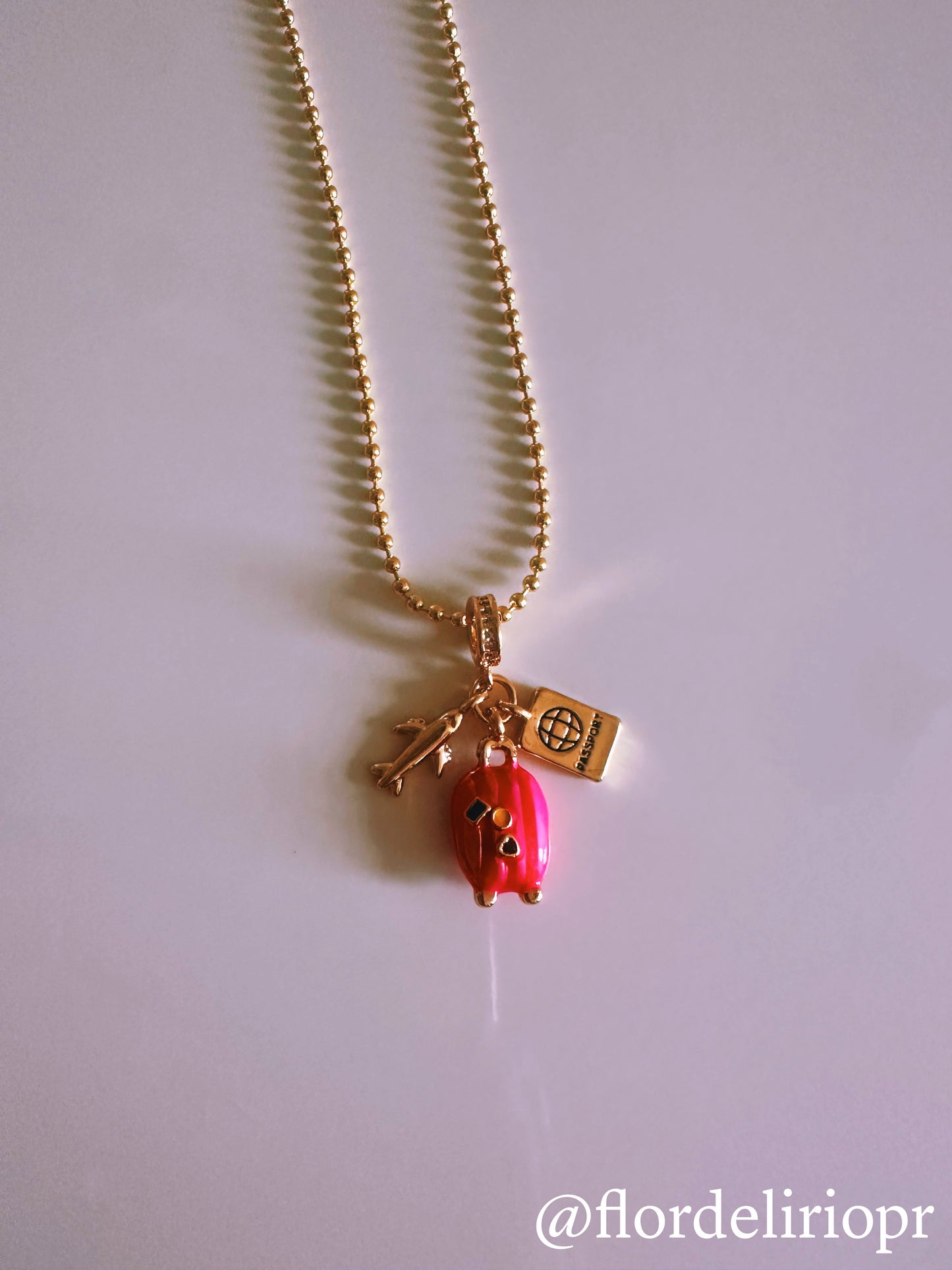 Pink baggage gold necklace