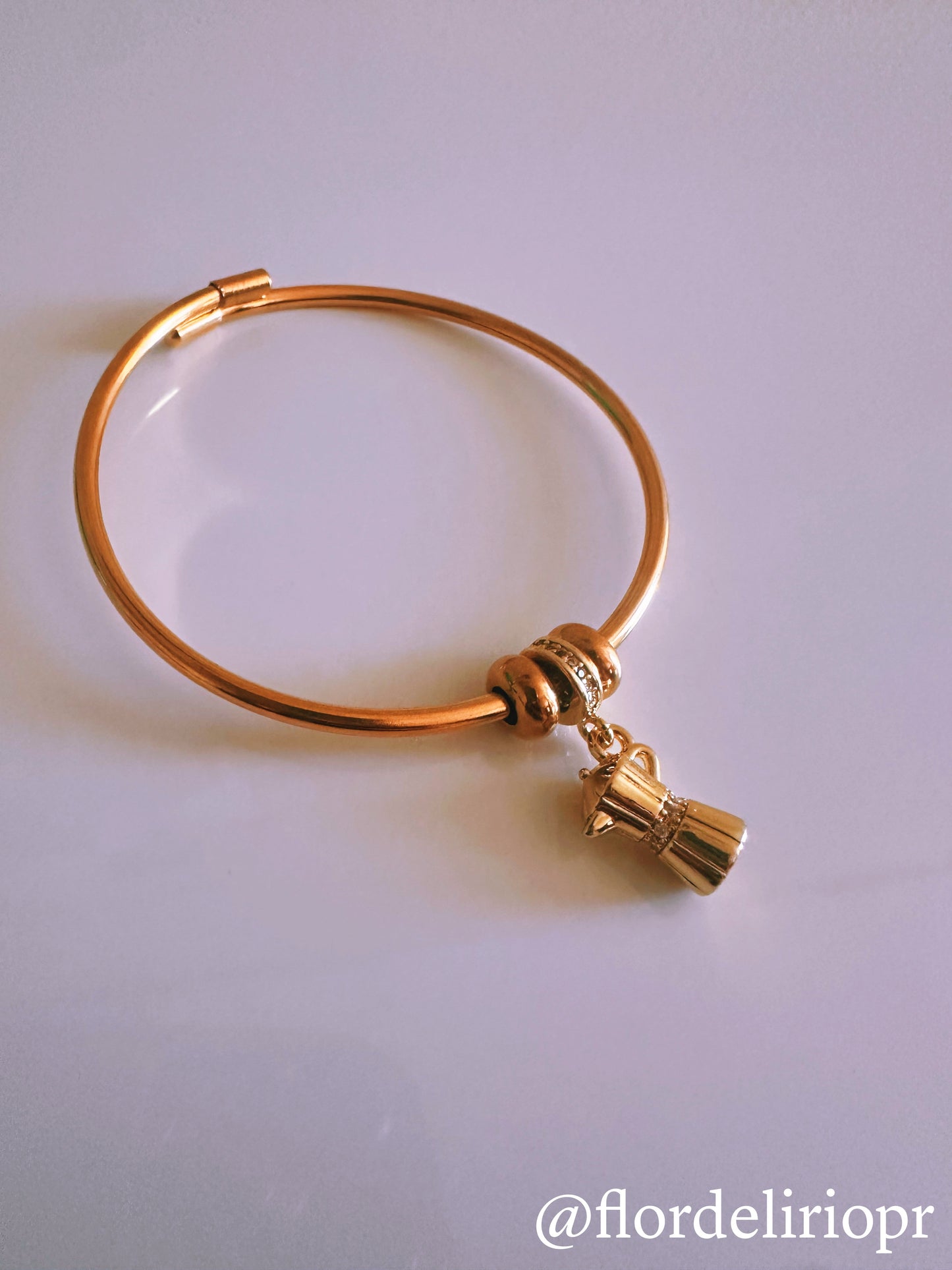 Gold greca bangle