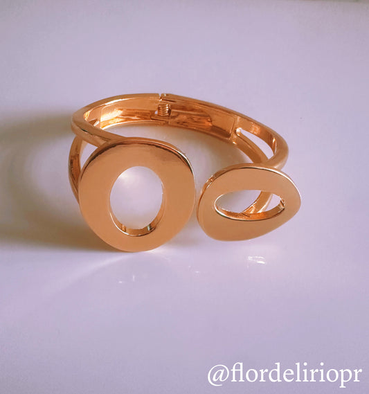Asymmetric gold cuff