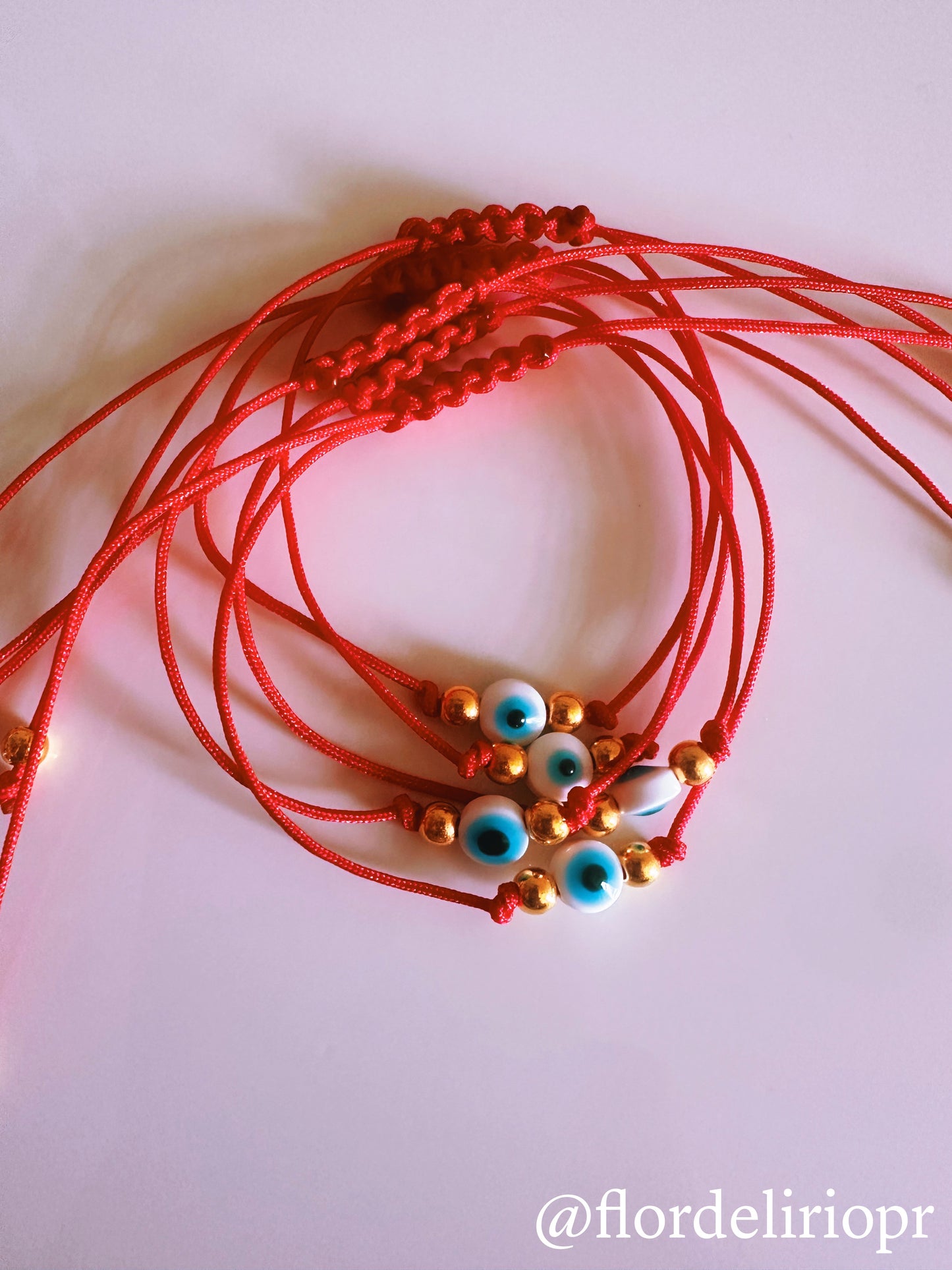Red nylon evil eye bracelet