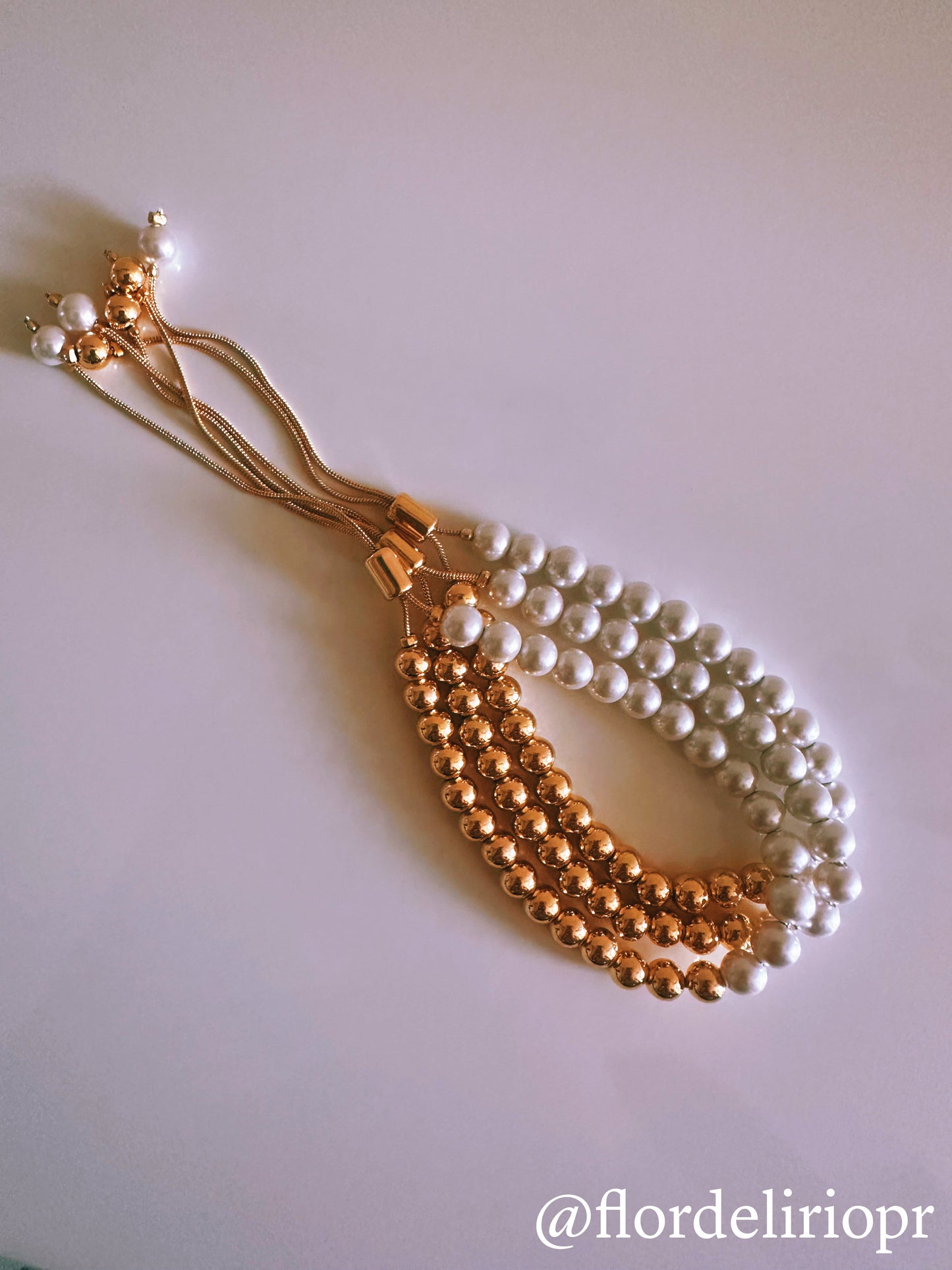 Half gold half pearls bracelet