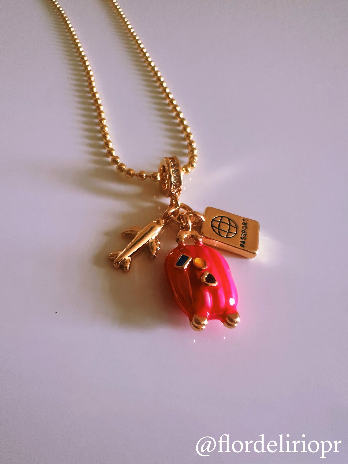 Pink baggage gold necklace