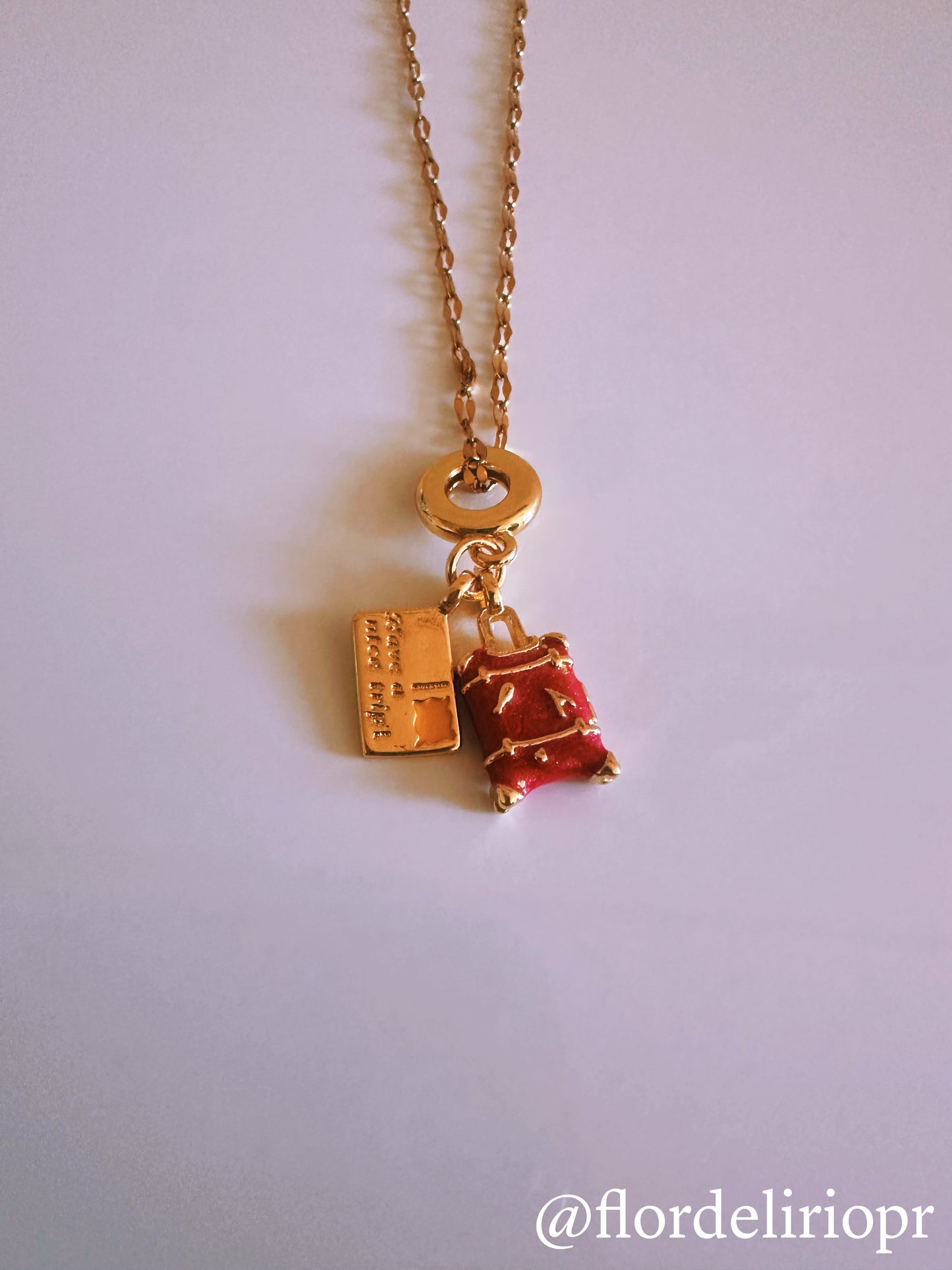 Nice trip fuschia baggage necklace
