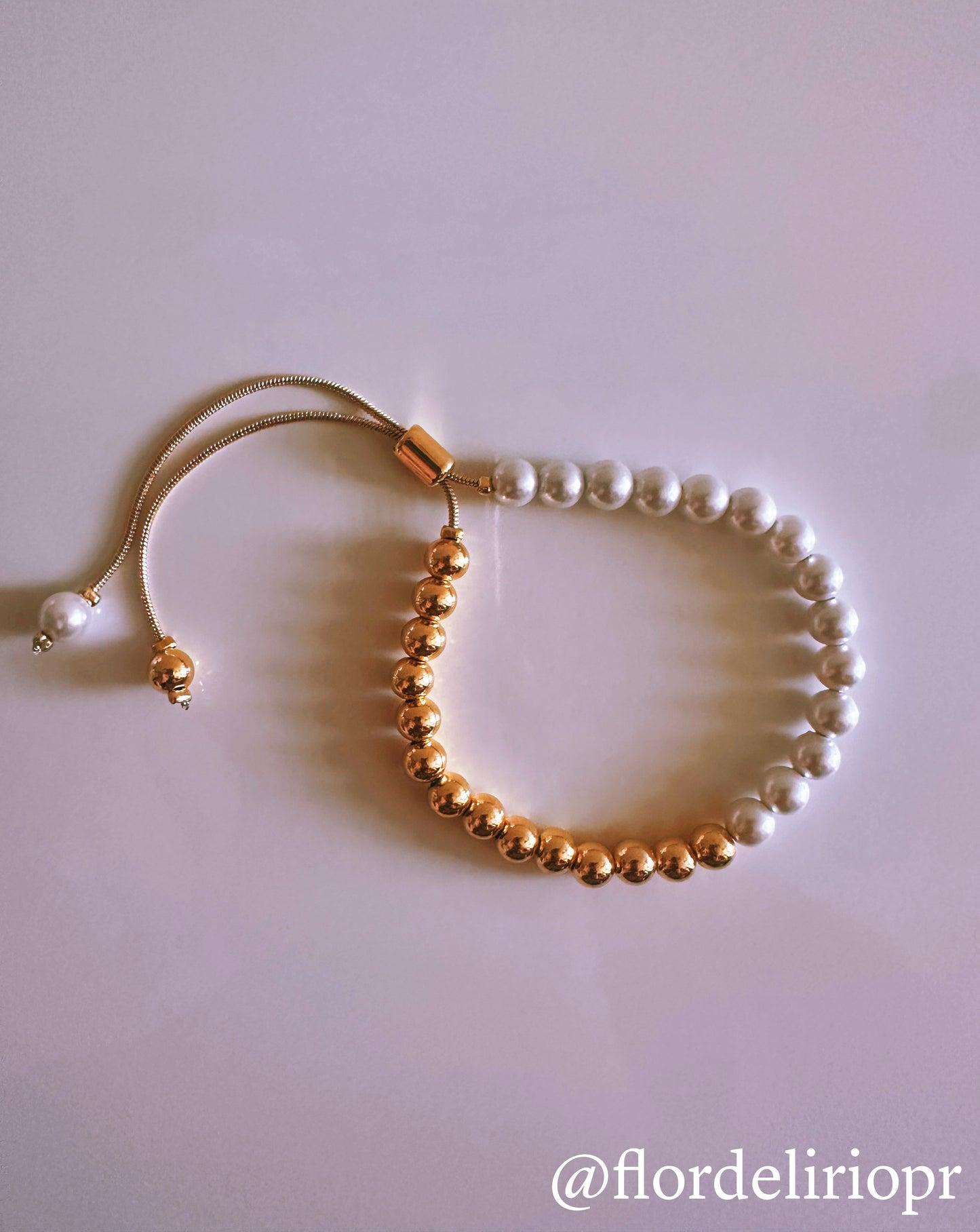 Half gold half pearls bracelet