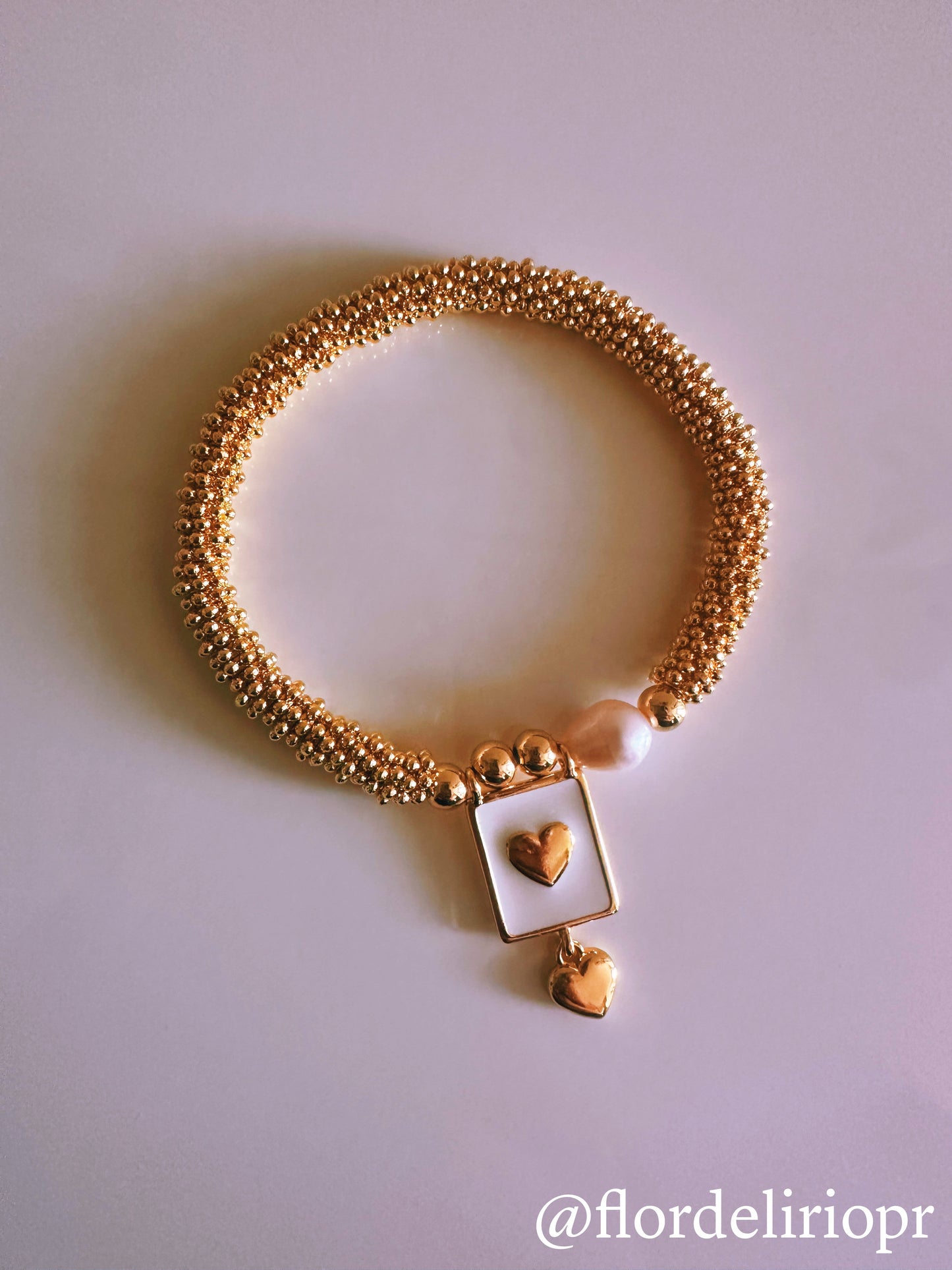 Pearl and heart gold bracelet