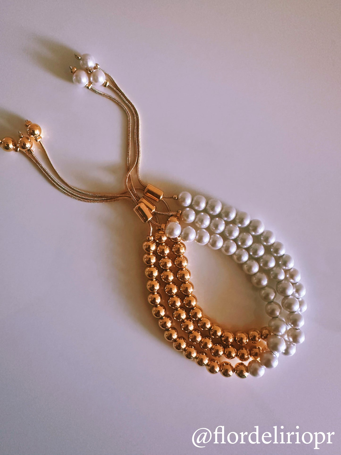 Half gold half pearls bracelet