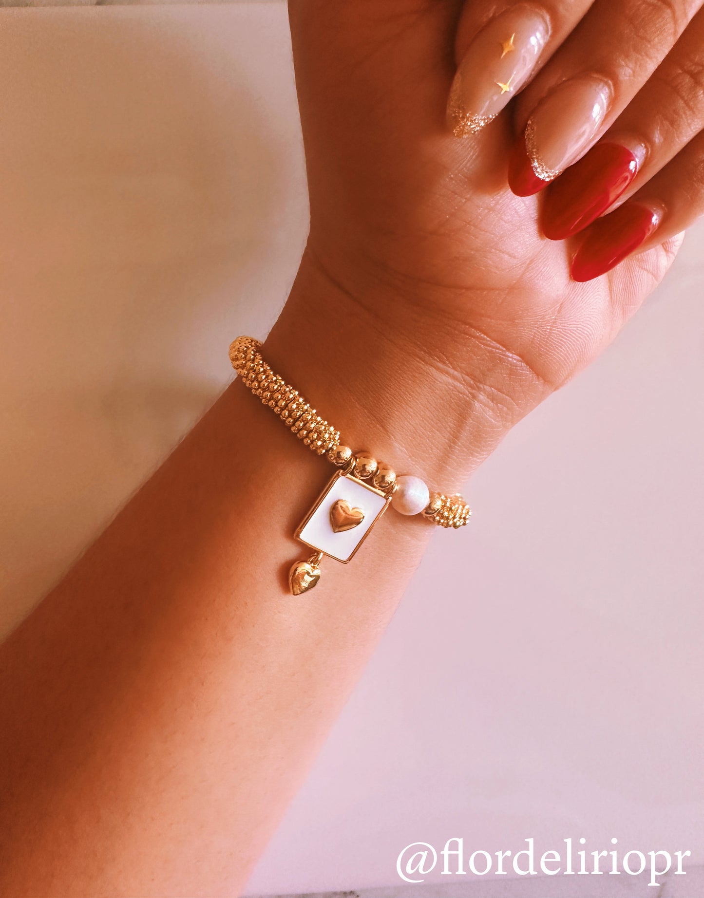 Pearl and heart gold bracelet