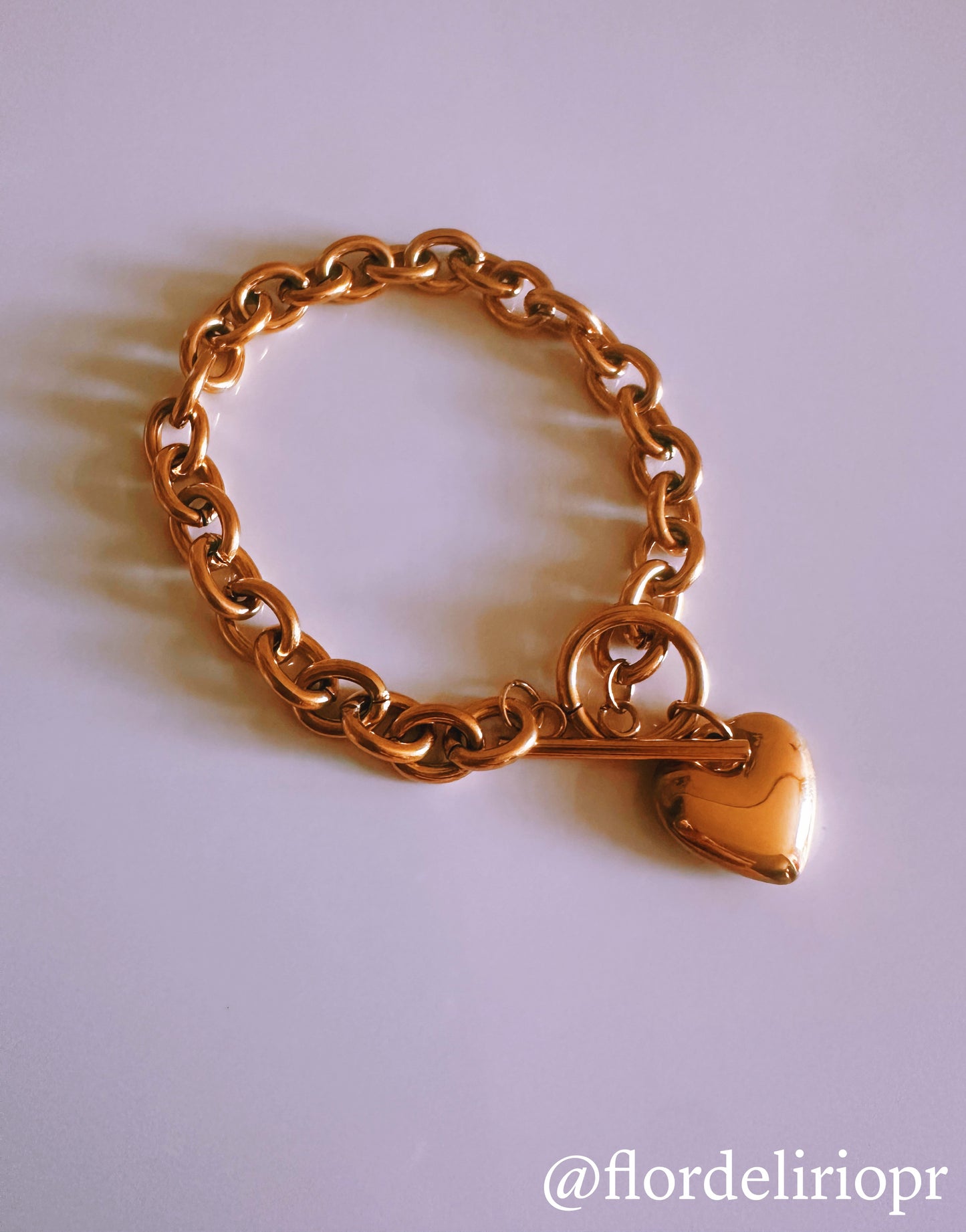 Heart charm linked bracelet